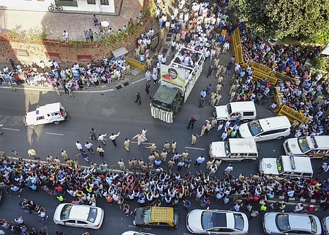 People attend the funeral procession of legendary singer Lata Mangeshkar, in Mumbai. (Photo | PTI)