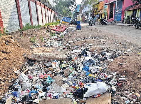 A road at GM Pettai in Kasimedu, which is yet to be relaid after storm water drains were constructed on its side an year ago | P Jawahar