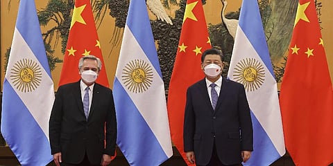 Xi Jinping, right, and Argentina's President Alberto Fernandez pose for a photo before their bilateral meeting at the Great Hall of the People in Beijing, Sunday, Feb. 6, 2022.(Photo | AP)
