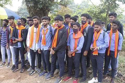Students came with saffron shawls to FMKMC College in Madikeri (Photo | Special arrangement)