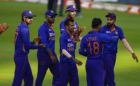 India's Yuzvendra Chahal, center is congratulated by team mates during the first ODI against West Indies in Ahmedabad, India, Sunday, Feb. 6, 2022. (Photo | AP)
