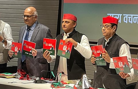 Samajwadi Party president Akhilesh Yadav releasing the party's manifesto on Tuesday. (Photo | Twitter)