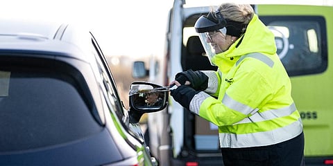 A member of staff collects a COVID-19 PCR test, at the Covid testing site of Svagertorp, Malmoe, Sweden, Tuesday, Feb. 8, 2022. (Photo | AP)