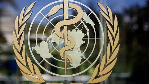 The logo of the World Health Organization is seen at the WHO headquarters in Geneva, Switzerland. 