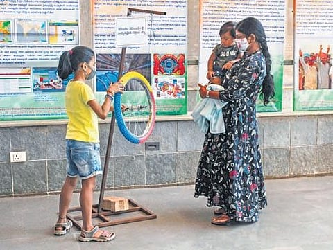 Participants take a look at the science projects on the last day of Science Week festival held at SPA in Vijayawada on Monday I Prasant Madugula