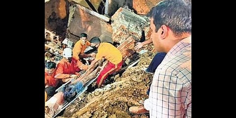 ​  Rescuers pull out a person from the debris at the mishap site.(Photo I Express ​)
