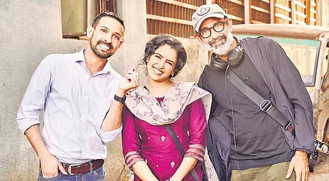 (L-R) Actors Vikrant Massey, Sanya Malhotra with director Shanker Raman