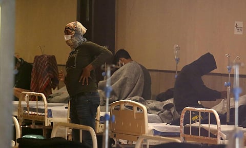 Covid-19 infected patients inside the Covid Care Centre at Shahnai Banquet hall in New Delhi. (File photo | Parveen Negi/EPS)