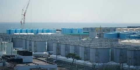 Tanks storing treated radioactive water after it was used to cool the melted fuel are seen at the Fukushima Daiichi nuclear power plant in Okuma town, Japan, March 3, 2022. (Photo | AP)
