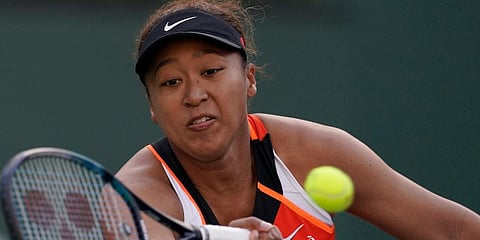 Naomi Osaka, of Japan, returns a shot to Sloane Stephens at the BNP Paribas Open tennis tournament Thursday, March 10, 2022, in Indian Wells, California (Photo | AP)