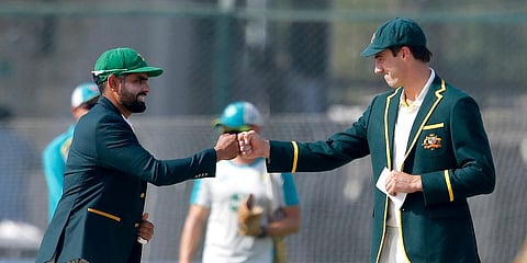 Pakistan's skipper Babar Azam, left, and Australian skipper Pat Cummins greet each other ahead of the 2nd Test match between their teams, Mar 12, 2022. (Photo | AP)