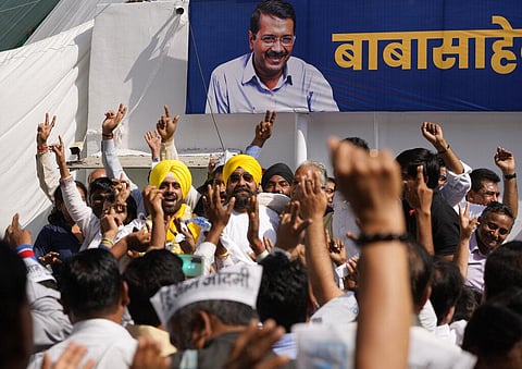 Supporters of Aam Aadmi party dance during celebrations at the party headquarters in New Delhi, Thursday, March 10, 2022. (Photo | AP)