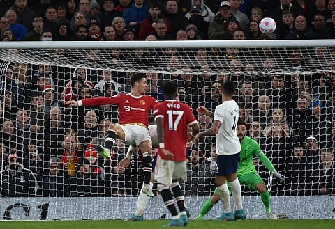Manchester United's Cristiano Ronaldo, left, scores his side's third goal during the English Premier League soccer match between Manchester United and Tottenham Hotspur,. ( Photo | AP)