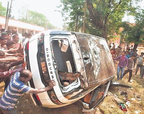 Irate people topple the car of the Chilika MLA at Banpur block after the incident