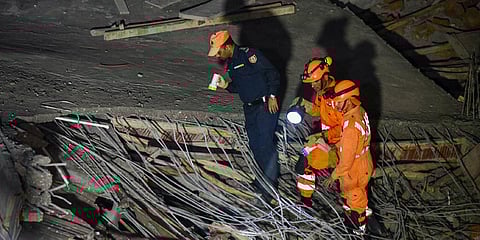 NDRF personnel carry out a rescue operation after an under-construction building collapses, at Kashmere Gate, in New Delhi. (Photo| ANI)