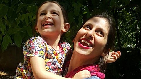 Nazanin Zaghari-Ratcliffe with her daughter Gabriella during a temporary release from prison. (File Photo | AFP)
