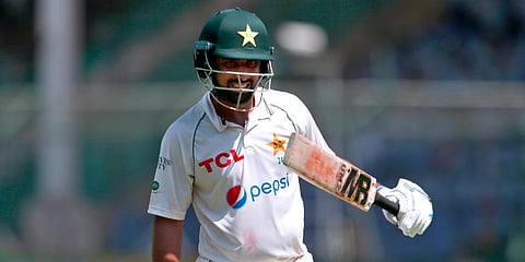 Abdullah Shafique reacts as he walks back to pavilion after his dismissal on the fifth day of the second Test match between Pakistan and Australia at the National Stadium in Karachi. (Photo | AP)