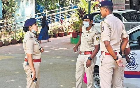 Police personnel deployed for security outside a college in Bengaluru on Tuesday | SHRIRAM BN  