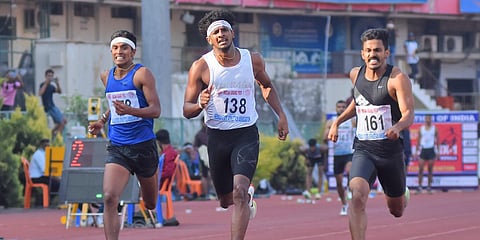Amoj Jacob (middle) won the 400m run by beating his Indian relay squad team-mate Noah Nirmal Tom (right). (Photo| BP Deepu, EPS)