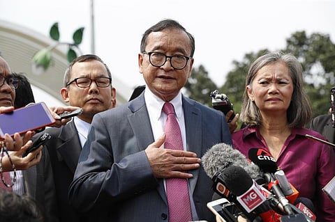 In this file photo, Cambodia's exiled opposition leader Sam Rainsy talks to the media outside Parliament House in Kuala Lumpur, Malaysia, in 2019 (AP photo)
