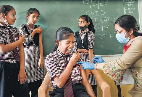 A student being given the Covid vaccine in Gurugram. (File photo| PTI)
