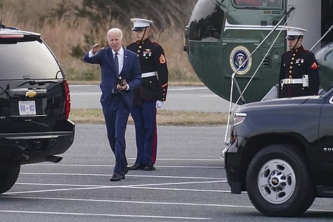 President Joe Biden waves as he arrives on Marine One in Rehoboth Beach, Del., Friday, March 18, 2022. (Photo | AP)