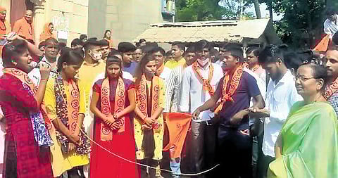 The district police booked a case against Bajrang Dal activist Pooja Veerashetty (extreme left with mic) for hate speech in Vijayapura | Express
