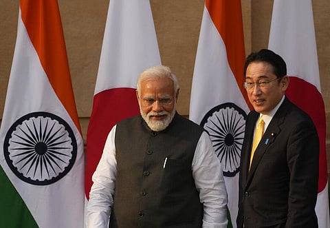 Indian Prime Minister Narendra Modi walks with his Japanese counterpart Fumio Kishida in New Delhi, Saturday, March 19, 2022. (Photo | AP)