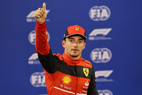 Ferrari driver Charles Leclerc of Monaco celebrates pole position after qualifying session for the Formula One Bahrain Grand Prix it in Sakhir, Bahrain. ( Photo | AP)