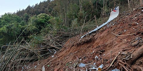 a piece of wreckage of the China Eastern's flight MU5735 are seen after it crashed on the mountain in Tengxian County. (Photo | AP)