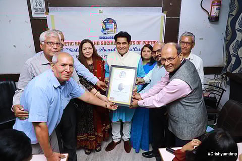 Delhi University professor Arun Kumar Jha bags 'World Poetry Award'