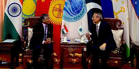 India's new Ambassador to China Pradeep K Rawat (L) and Shanghai Cooperation Organisation secretary-general Zhang Ming. (Photo| Twitter)