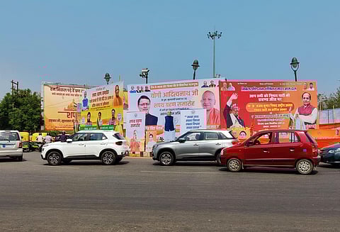 Hoardings installed as part of preparations of the oath-taking ceremony of BJP leader Yogi Adityanath as Uttar Pradesh Chief Minister on March 25, on Thursday. (Photo | ANI)