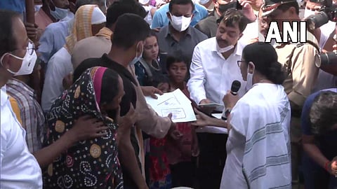 West Bengal Chief Minister Mamata Banerjee meets the kin of those killed in Birbhum violence in Bagtui village, Rampurhat, on Thursday. (Photo | ANI Twitter)