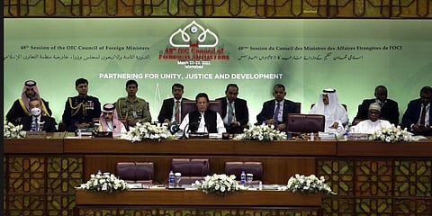 Imran Khan, center, attend at the start of a two-day gathering of the 57-member Organization of Islamic Cooperation, at the Parliament House in Islamabad, Pakistan, March 22, 2022.(Photo | AP)