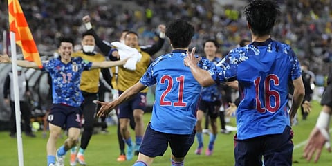 Japan's Kaoru Mitoma celebrates after scoring a goal during the World Cup 2022 play-off soccer match between Japan and Australia,Thursday, March 24, 2022.(Photo | AP)