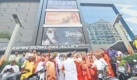 A group of seers arrives to watch ‘The Kashmir Files’ at a cinema hall in Surat, Gujarat, on Wednesday. (Photo | PTI)