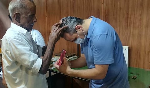 Arjun Das with  Karunan Vaidyar. ( Photo | EPS)