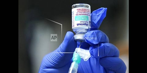 Jose Lazaro  prepares a two-shot dose of AstraZeneca's Evusheld, the first set of antibodies grown in a lab to prevent COVID-19, on Jan. 20, 2022(Photo |AP)