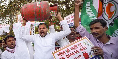 Bihar Youth Congress activists stage a protest over hike in petrol, diesel and LPG cylinder prices in Patna. (Photo| PTI)