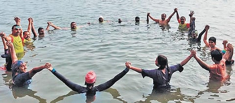 Students learn swimming techniques. (Photo | Express)