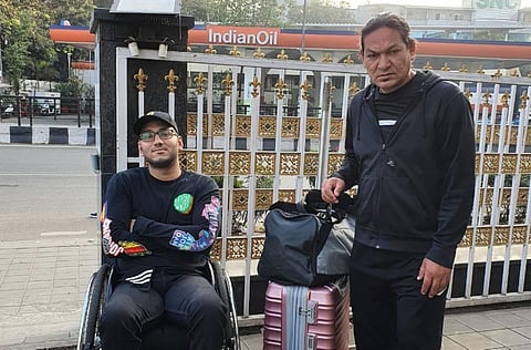 Abhishek Chamoli with coach Hukam Singh Rawat *Right).  (Photo | Special Arrangement)