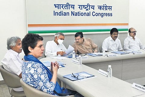 Congress general secretary Priyanka Gandhi Vadra and other leaders at a meeting at AICC headquarters in New Delhi on Saturday | express