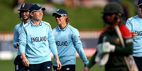 England's captain Heather Knight (L) celebartes with teammates after a win during the Women's Cricket World Cup match between the England and Bangladesh.(Photo | AP)