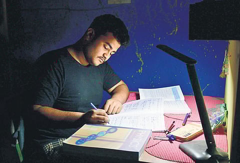 A Class 12 student prepares for examination | Parveen Negi