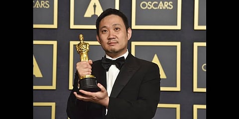 Ryusuke Hamaguchi, winner of the award for 'Drive My Car,' from Japan, for best international feature film, poses in the press room at the Oscars 2022(Photo | AP)