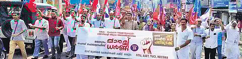 Protesters raise slogans during the strike in Malappuram on Monday