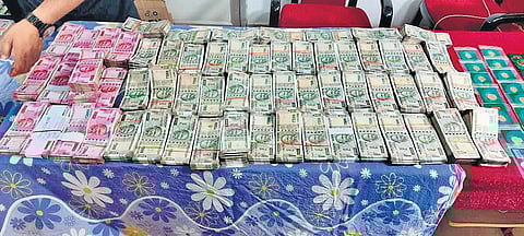 Cash seized from the possession of Superintending Engineer Ashish Dash. ) Photo | EPS)