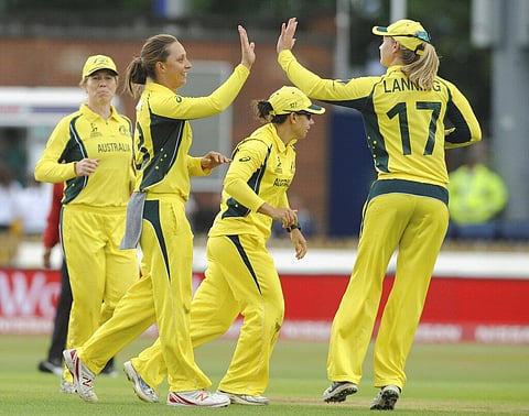 Australia's Ashleigh Gardner, left, celebrates with Australia's Meg Lanning after dismissing India's Poonam Raut during the ICC Women's World Cup 2017 (Photo | AP)