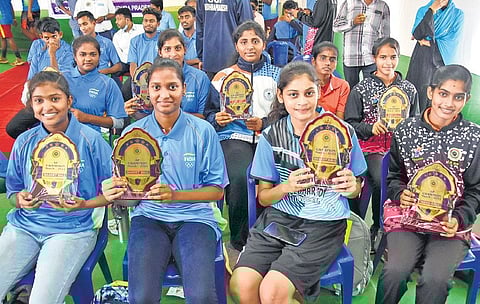 Winners of the SAAP basketball and handball league matches with th after the felicitation at IGMC Stadium in Vijayawada. (Photo | EPS)